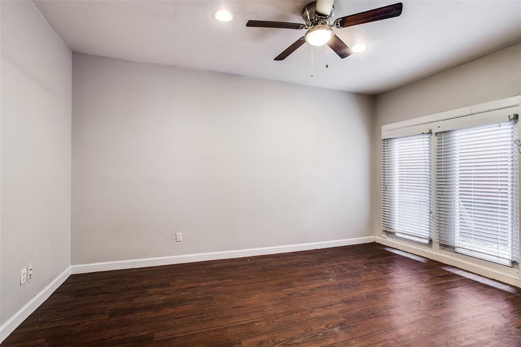 5114 Bryan Street, Unit 3 Dallas, TX 75206 - Photo 9 of 22 a view of empty room with wooden floor and fan