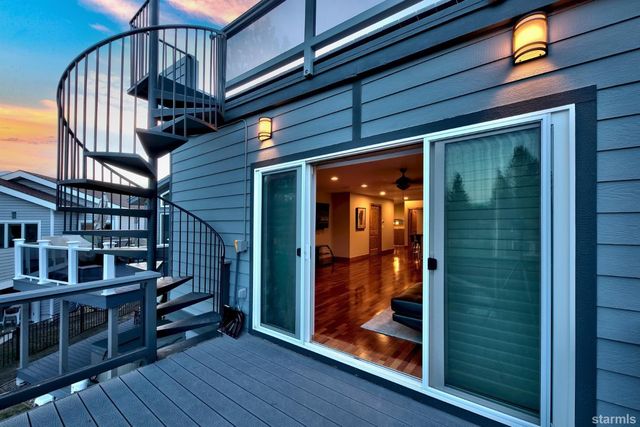 a view of entryway with wooden door