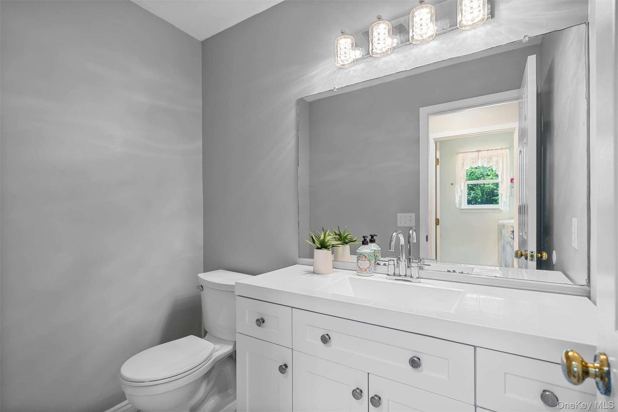 36 Lexington Drive Newburgh, NY 12550 - Photo 20 of 50 Half bathroom with toilet and vanity