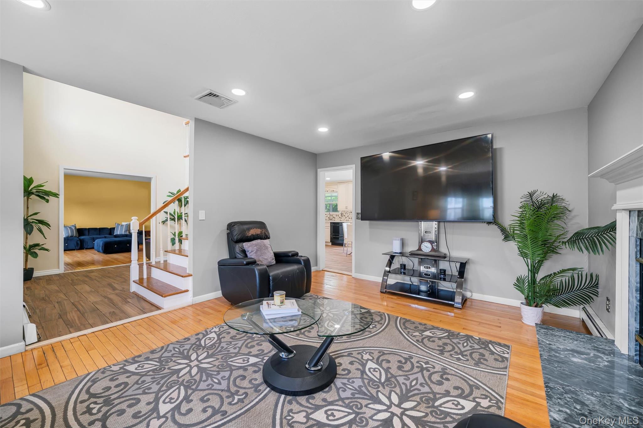 36 Lexington Drive Newburgh, NY 12550 - Photo 23 of 50 Living area with hardwood / wood-style flooring, stairs, baseboards, and recessed lighting