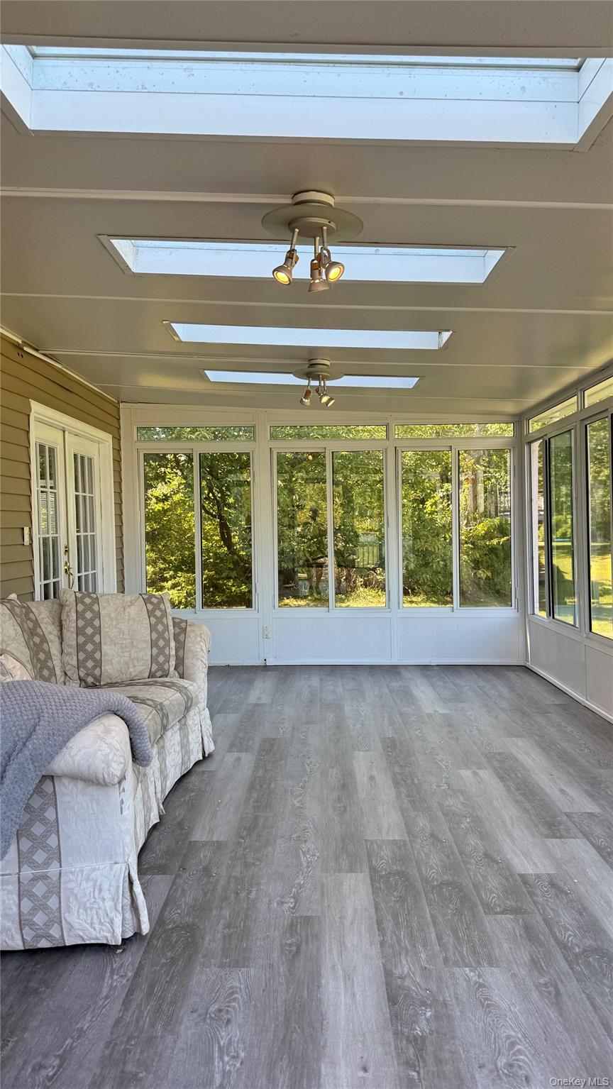 36 Lexington Drive Newburgh, NY 12550 - Photo 37 of 50 Sunroom / solarium with a skylight, wood finished floors, and french doors