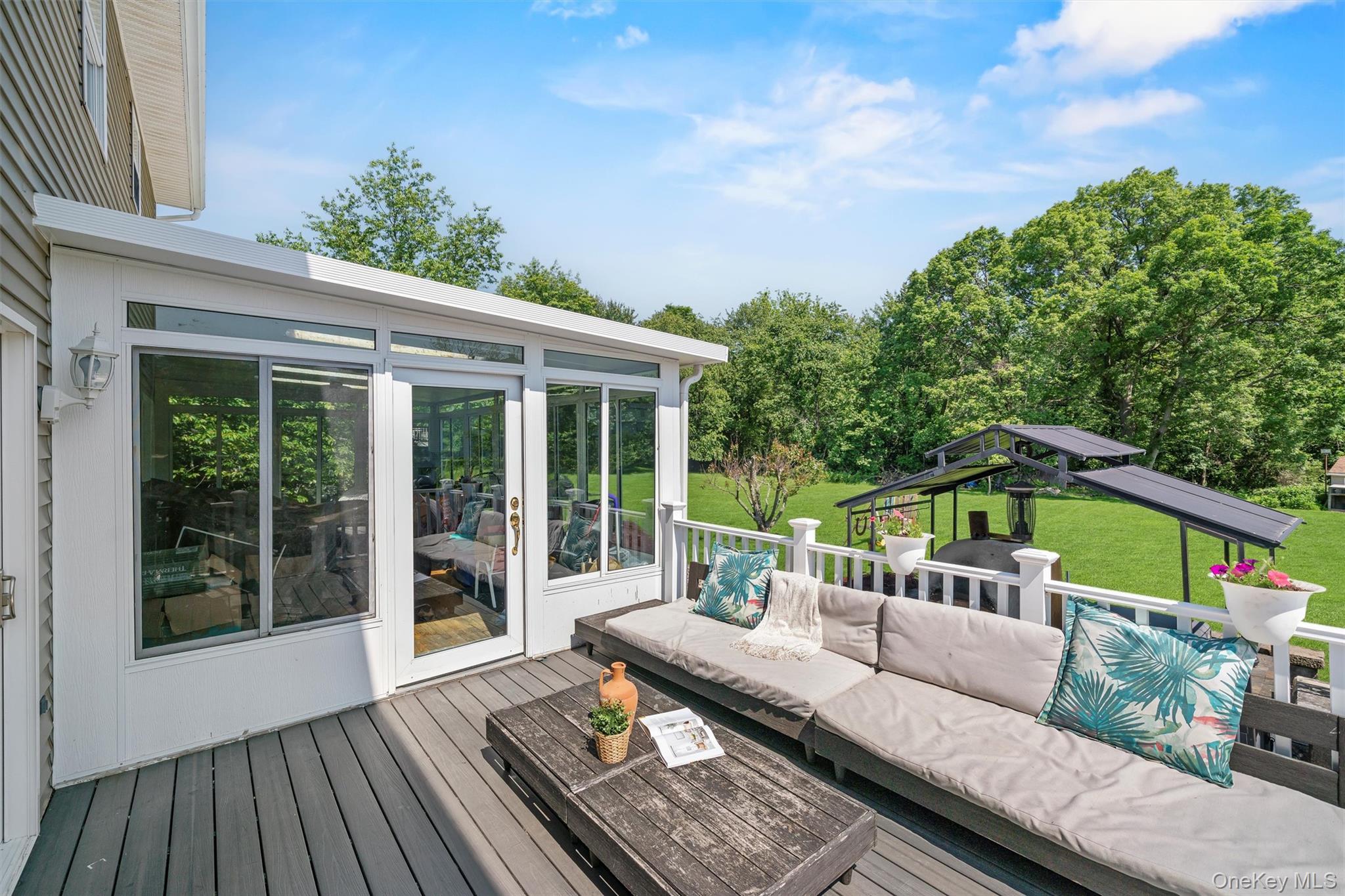 36 Lexington Drive Newburgh, NY 12550 - Photo 39 of 50 Wooden terrace with an outdoor living space, a yard, and a sunroom