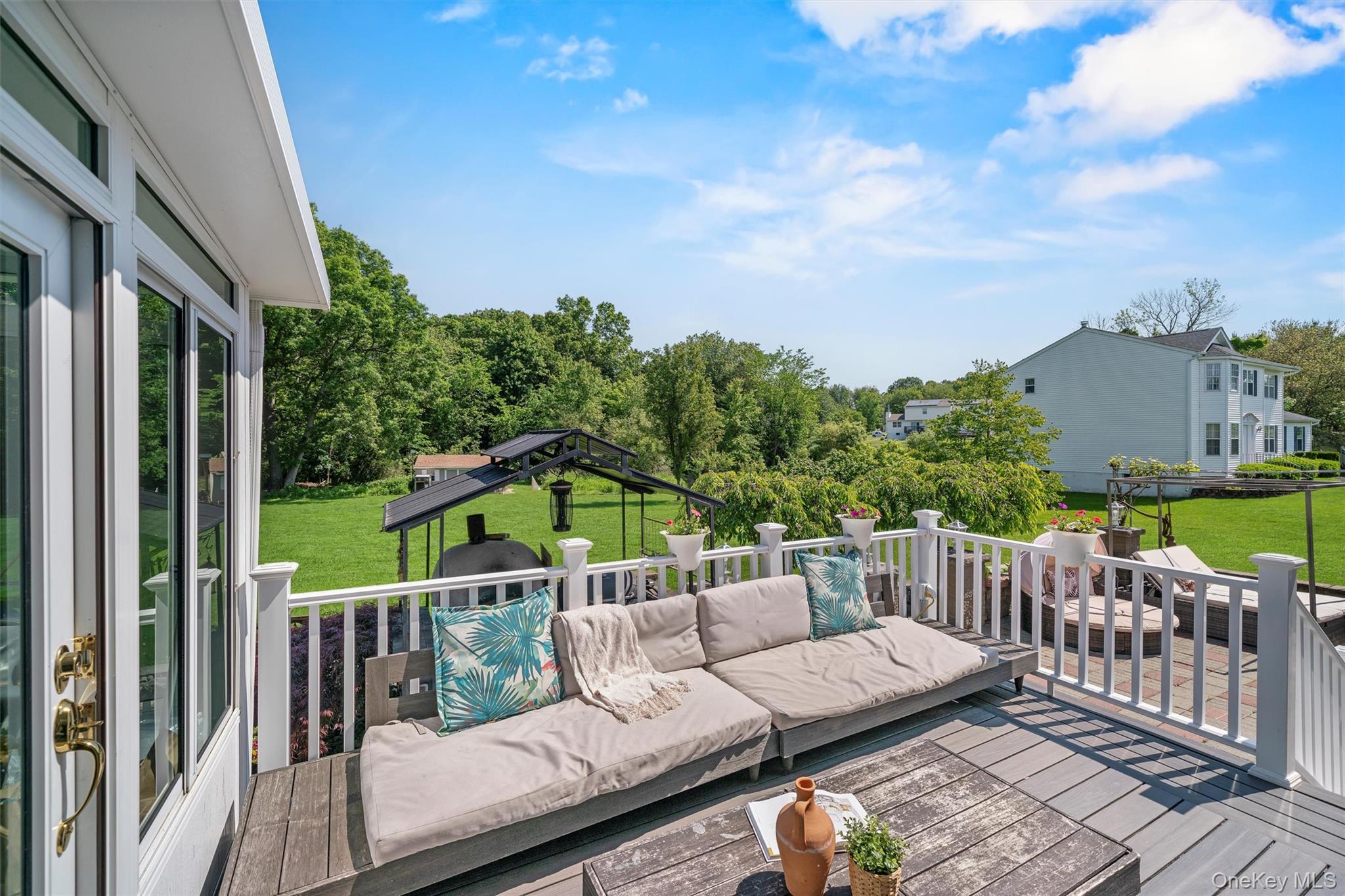 36 Lexington Drive Newburgh, NY 12550 - Photo 40 of 50 Wooden deck featuring a lawn and outdoor lounge area