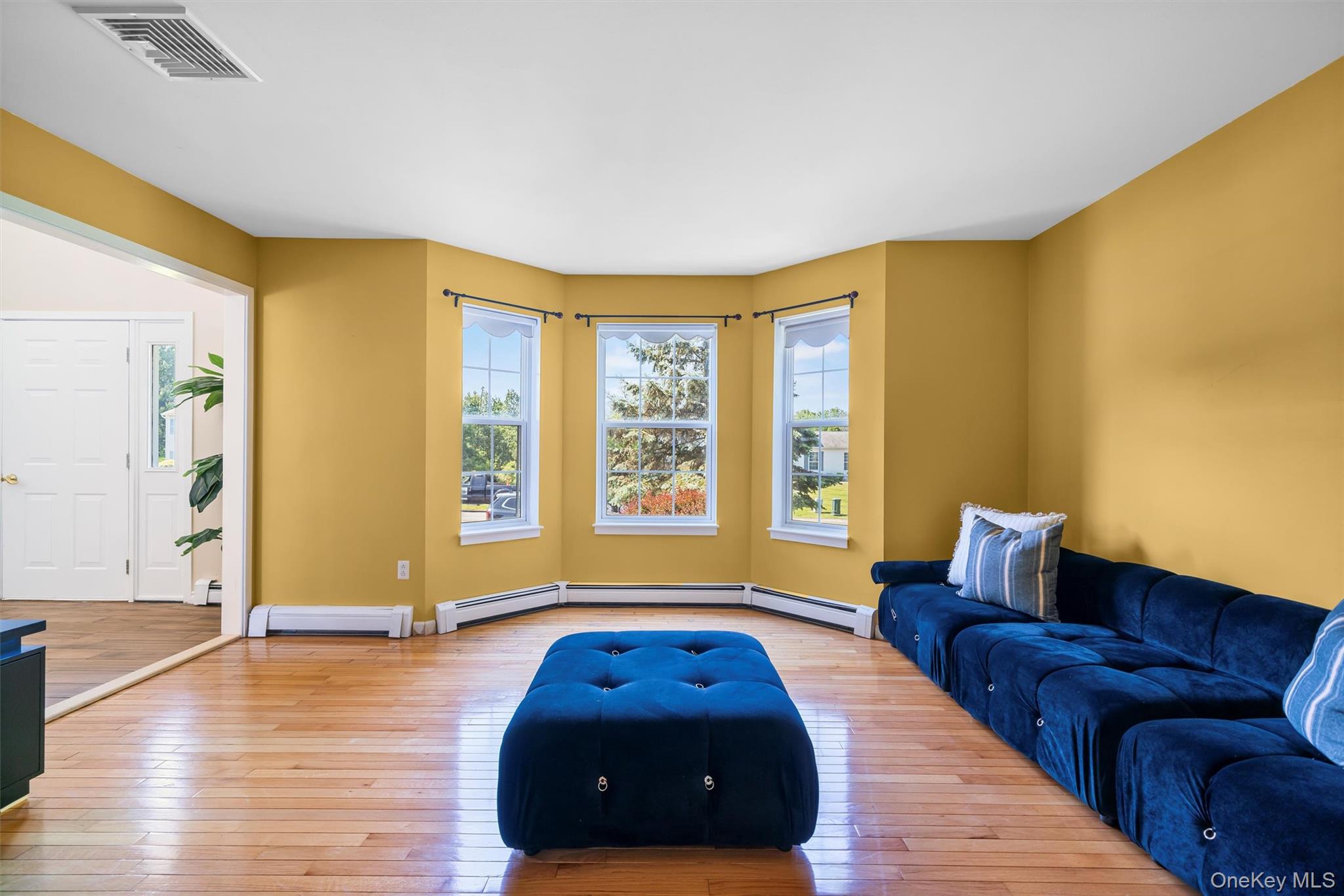36 Lexington Drive Newburgh, NY 12550 - Photo 7 of 50 Living room featuring wood-type flooring and baseboards