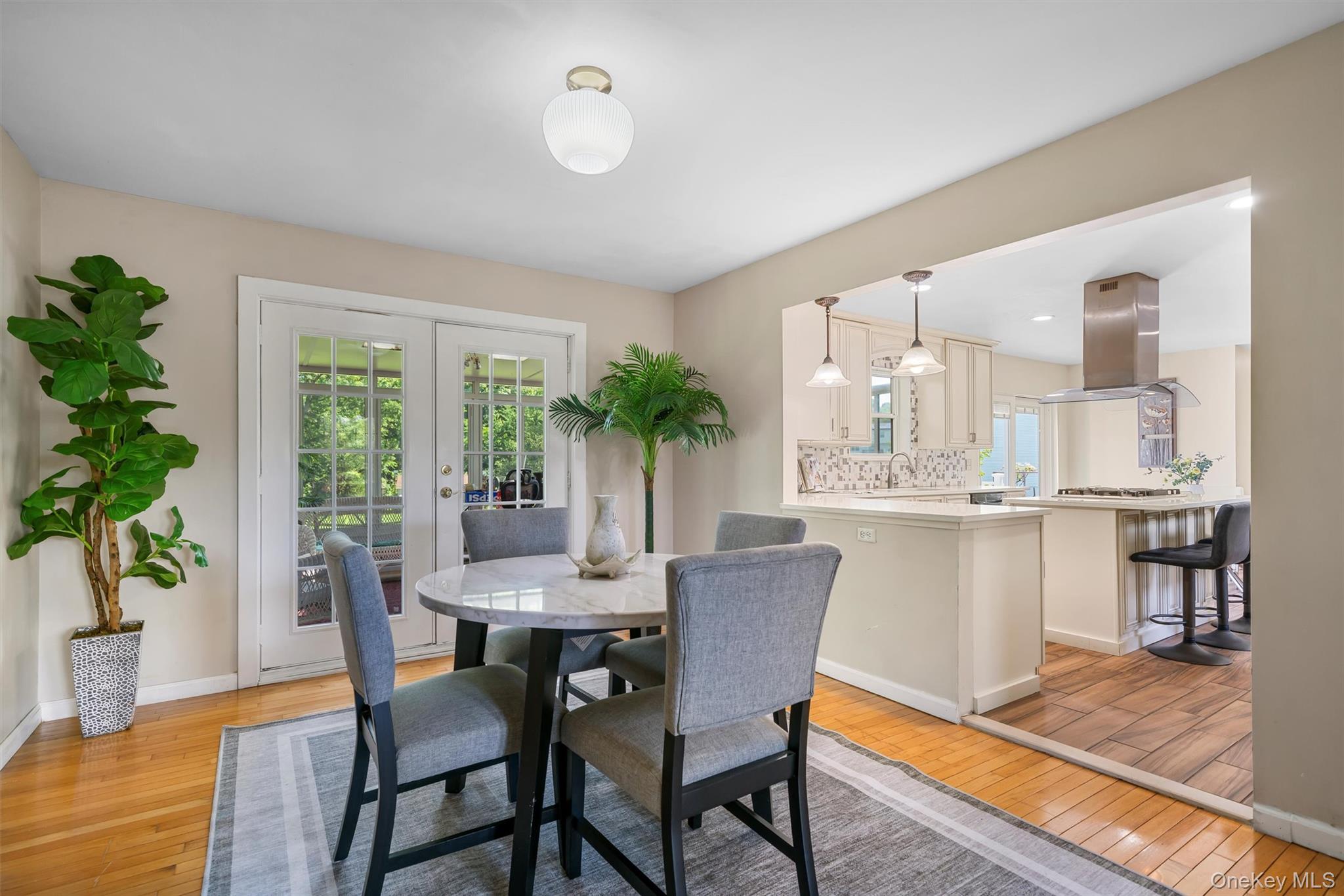 36 Lexington Drive Newburgh, NY 12550 - Photo 9 of 50 Dining space with french doors, light wood-style floors, and baseboards