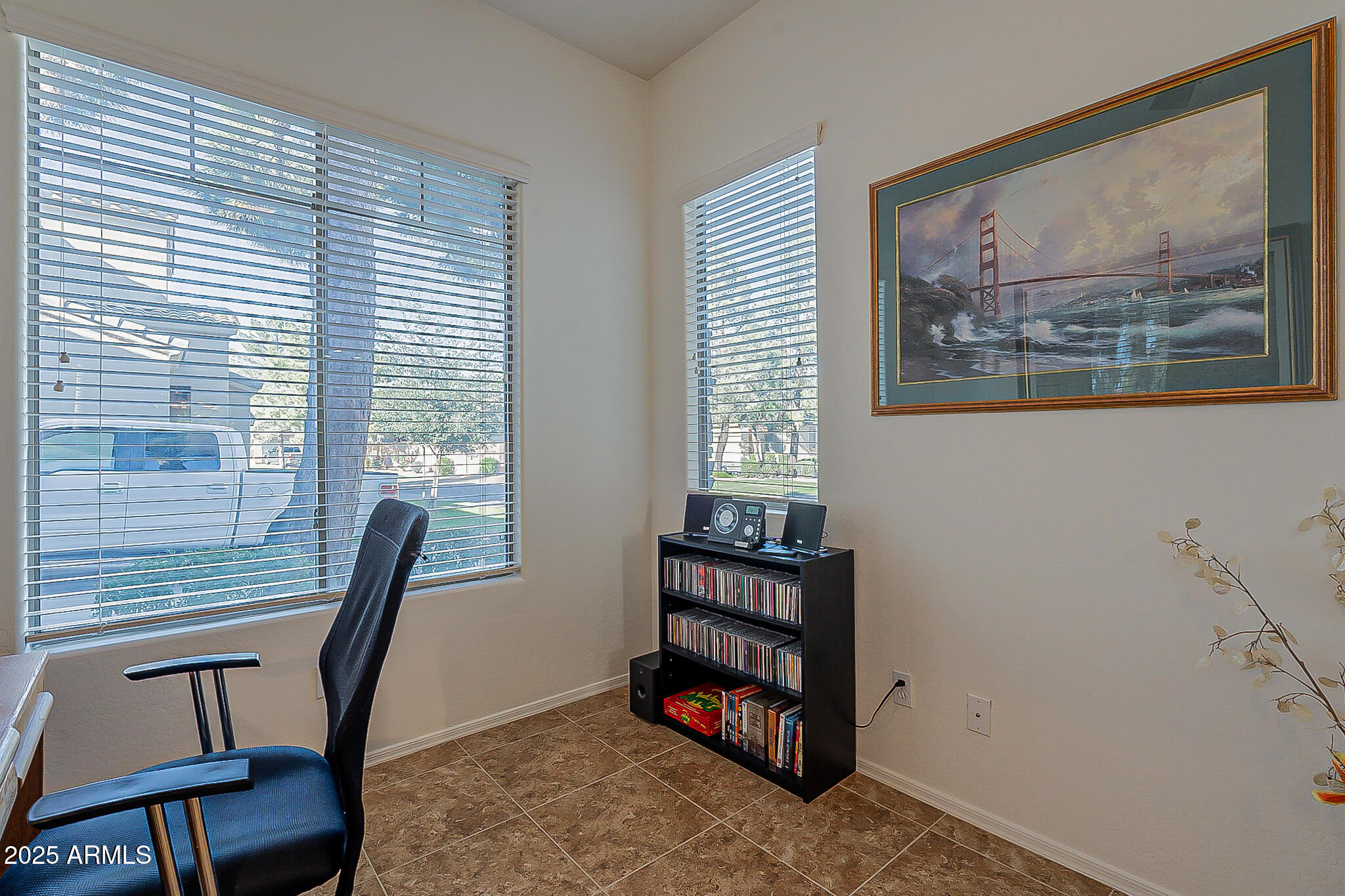 1857 West Periwinkle Way Chandler, AZ 85248 - Photo 19 of 38 a view of a workspace with furniture and a window