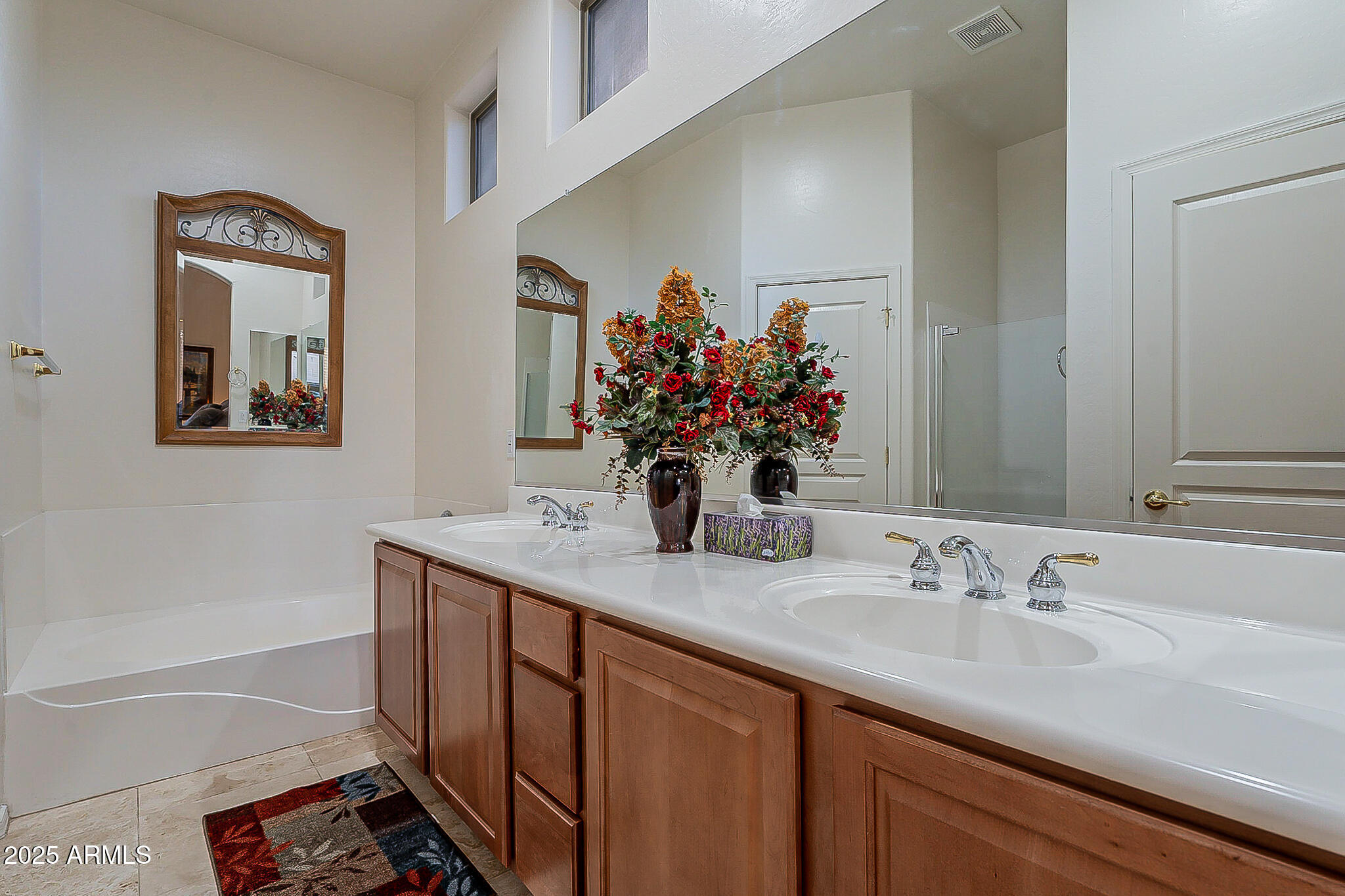 1857 West Periwinkle Way Chandler, AZ 85248 - Photo 24 of 38 a bathroom with a sink and a bathtub