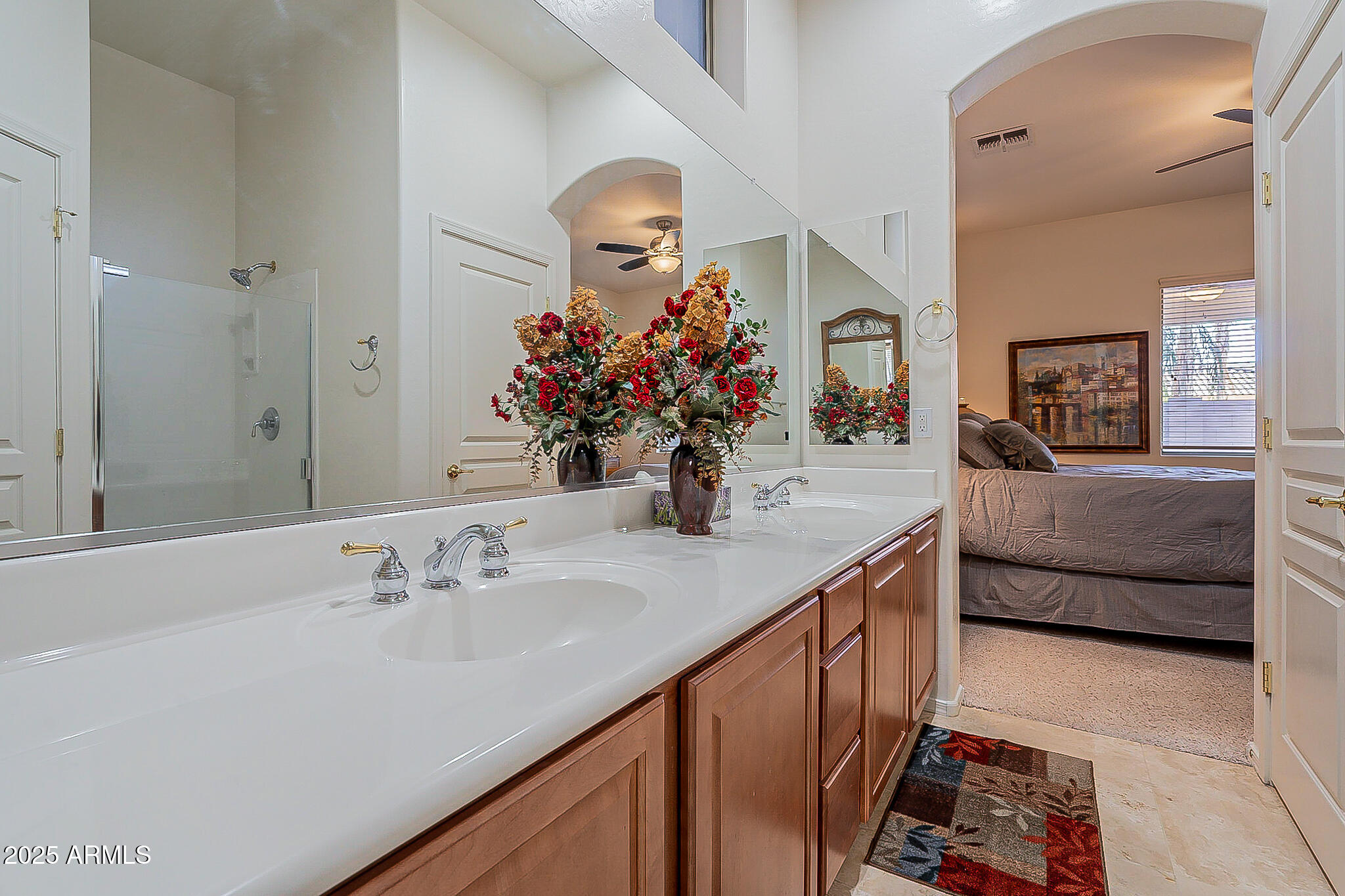 1857 West Periwinkle Way Chandler, AZ 85248 - Photo 26 of 38 a en suite bathroom with a double vanity sink and a mirror