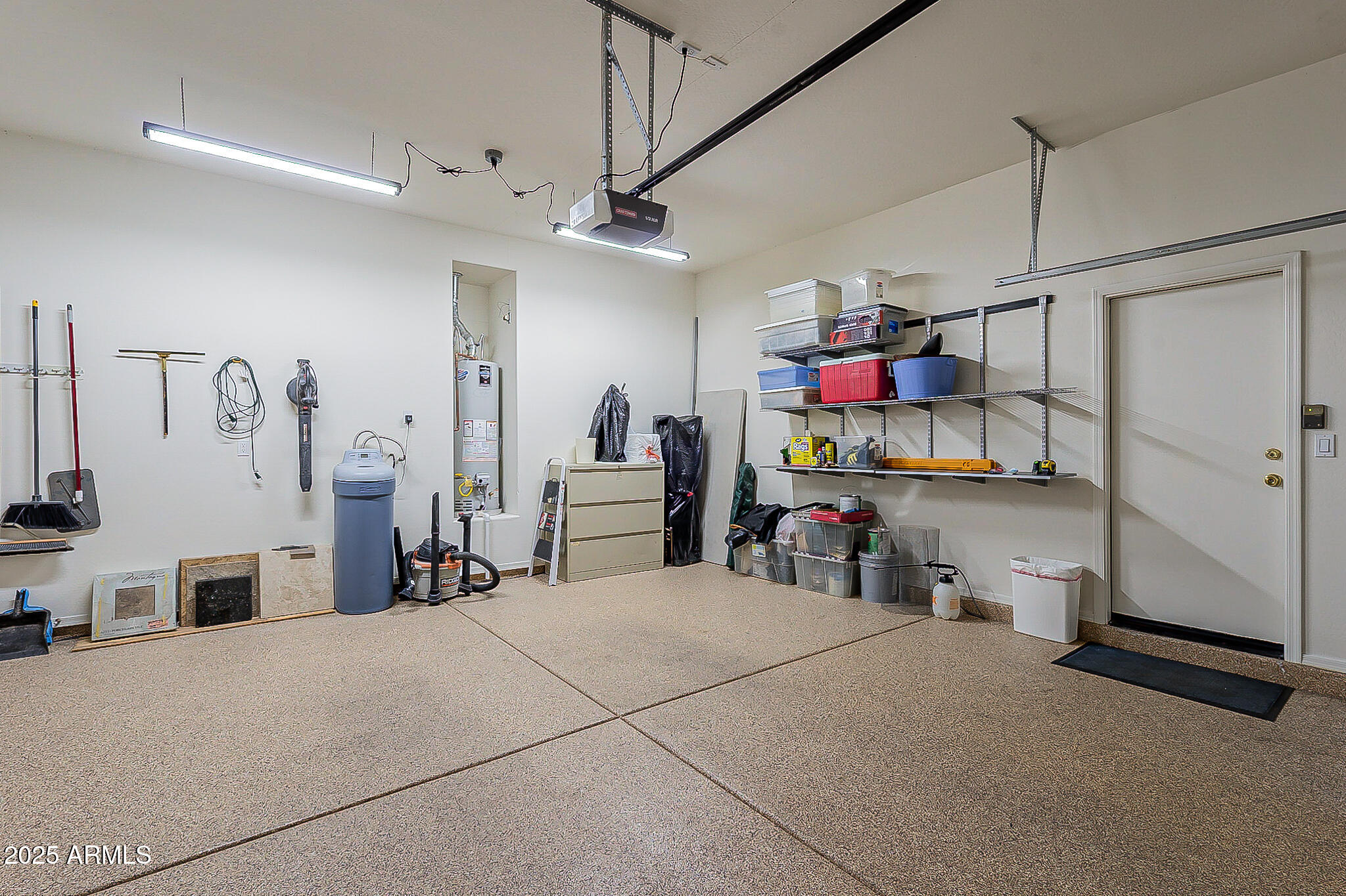 1857 West Periwinkle Way Chandler, AZ 85248 - Photo 32 of 38 a bedroom with furniture and a flat screen tv