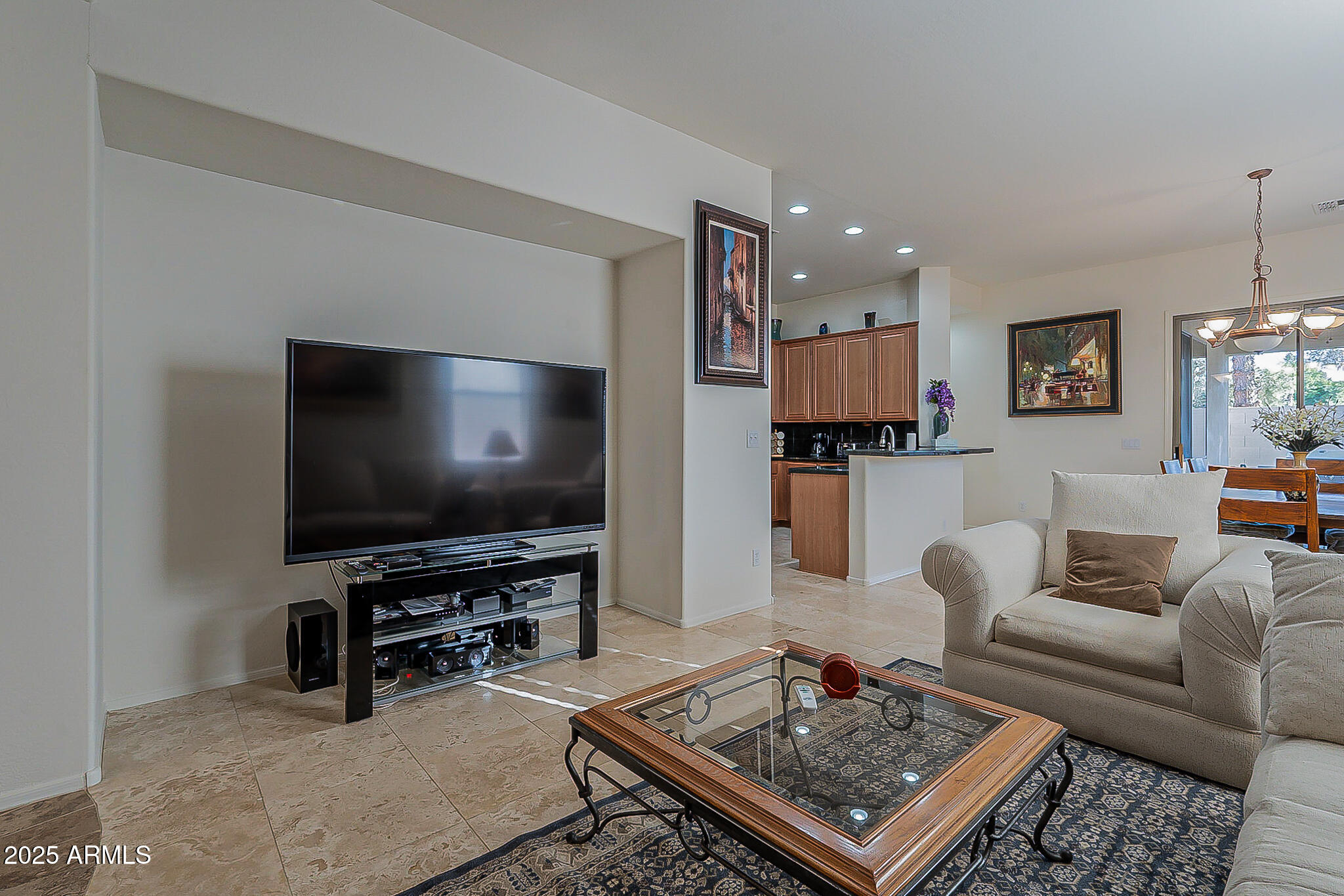 1857 West Periwinkle Way Chandler, AZ 85248 - Photo 7 of 38 a living room with furniture and a flat screen tv