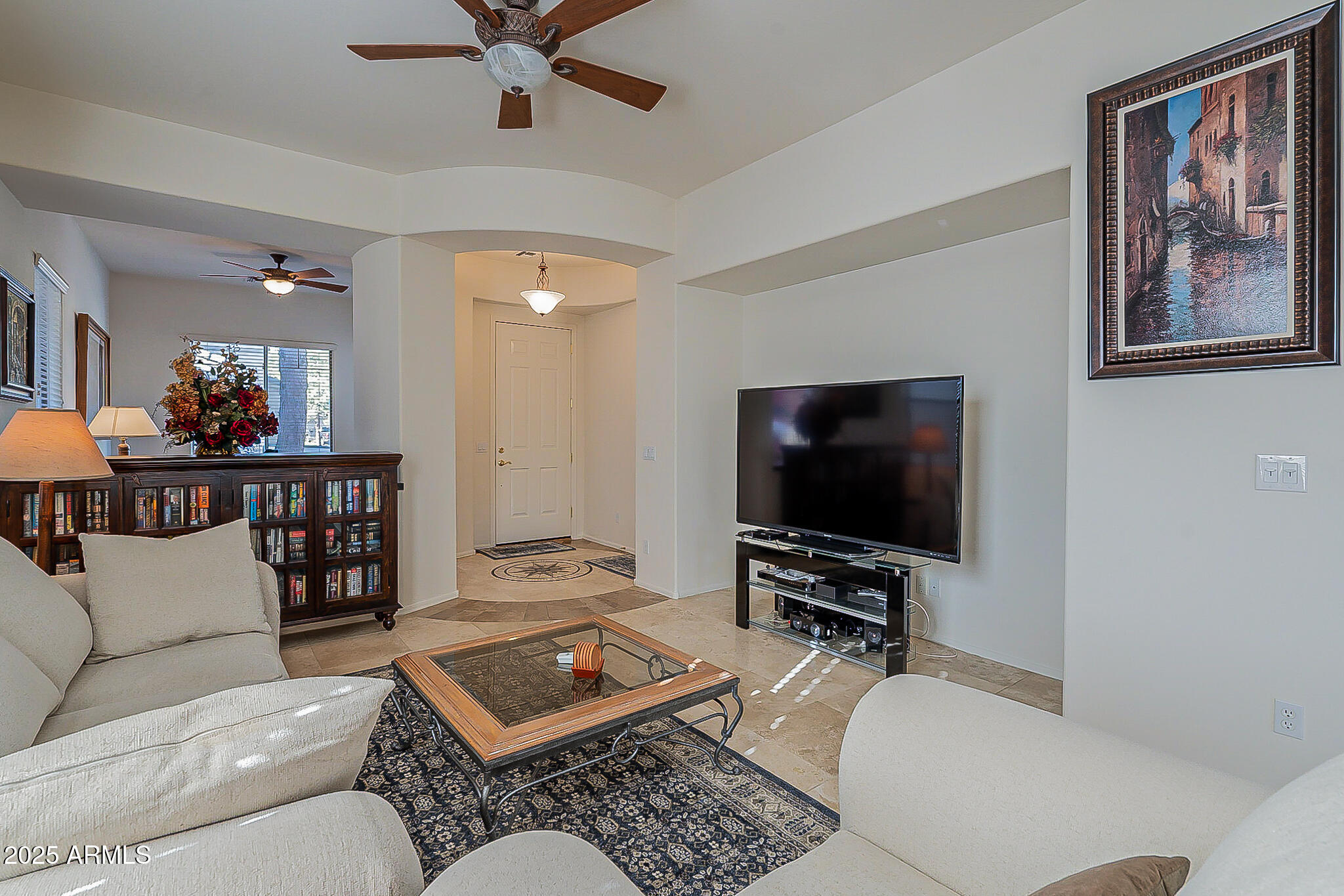 1857 West Periwinkle Way Chandler, AZ 85248 - Photo 8 of 38 a living room with furniture and a flat screen tv