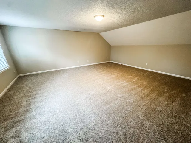 an empty room with a natural light