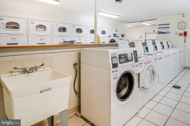 a utility room with dryer and washer