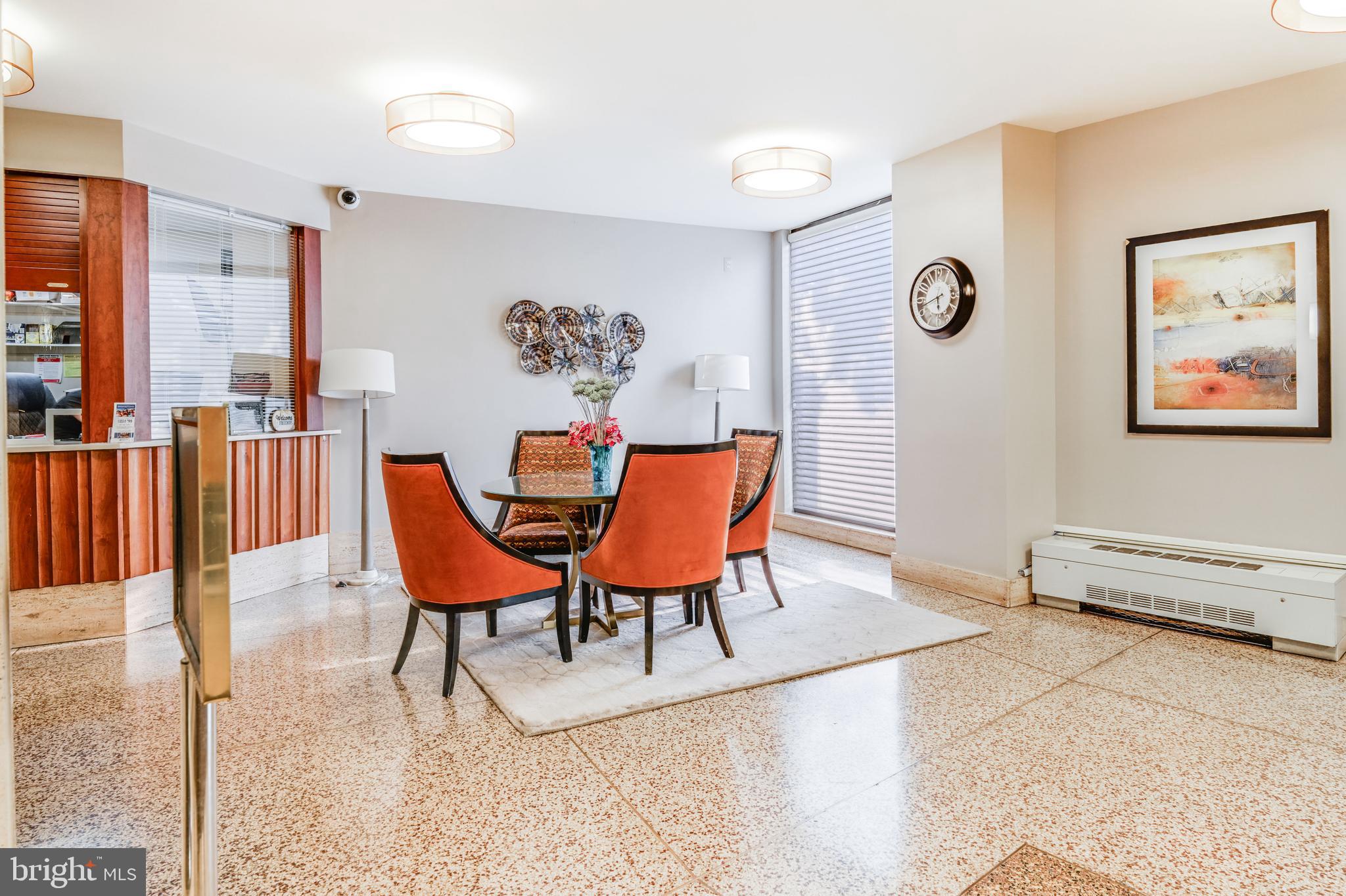 1111 University Boulevard West, Unit 611A Silver Spring, MD 20902 - Photo 24 of 30 a dining room with furniture and window