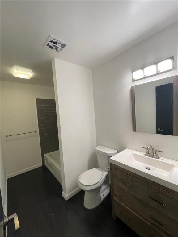 4416 Chowning Way Atlanta, GA 30338 - Photo 14 of 17 a bathroom with a sink a toilet a mirror and shower