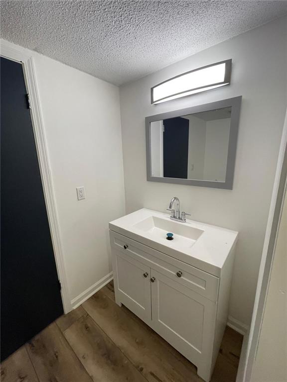 4416 Chowning Way Atlanta, GA 30338 - Photo 17 of 17 a bathroom with a sink and a mirror