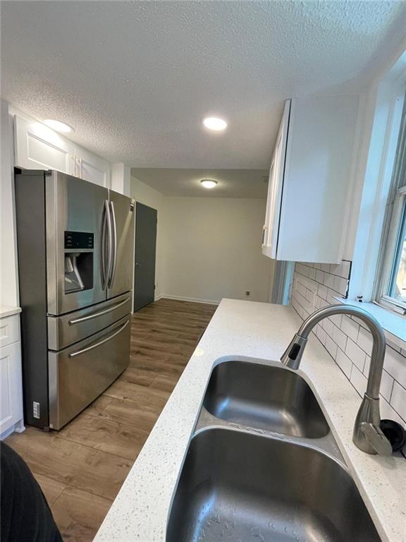 4416 Chowning Way Atlanta, GA 30338 - Photo 5 of 17 a kitchen with a sink and refrigerator