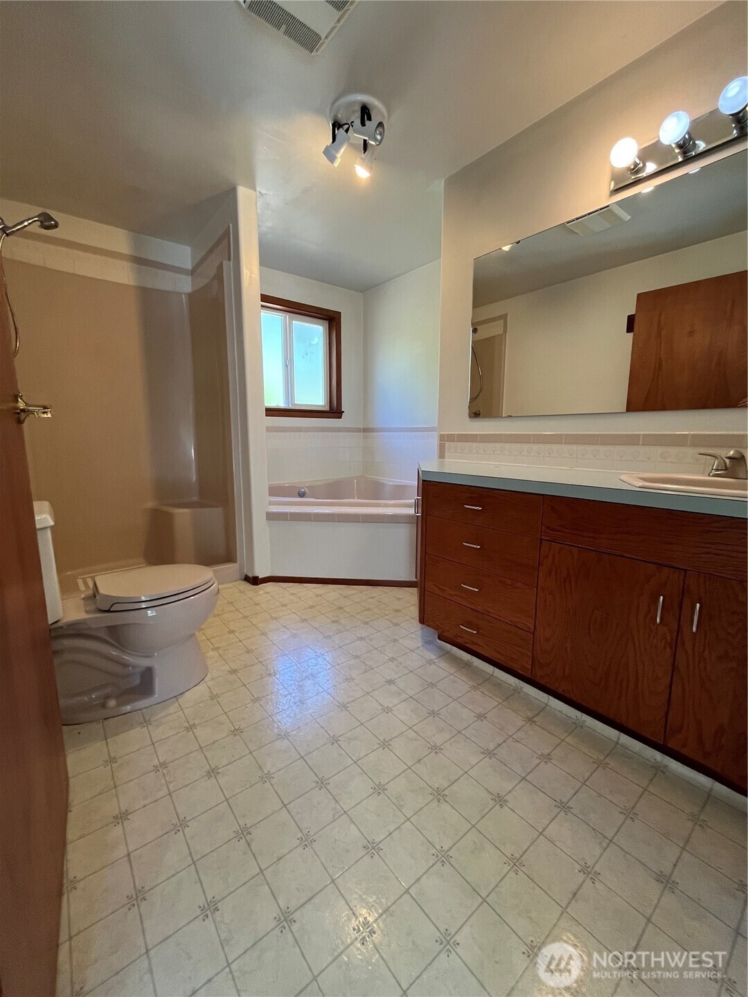 80 Southeast Channel Point Road Shelton, WA 98584 - Photo 11 of 26 a bathroom with a sink a toilet and mirror