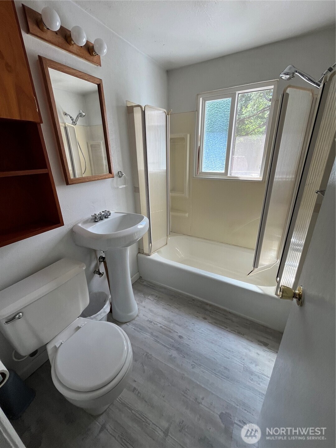 80 Southeast Channel Point Road Shelton, WA 98584 - Photo 16 of 26 a bathroom with a sink toilet and mirror