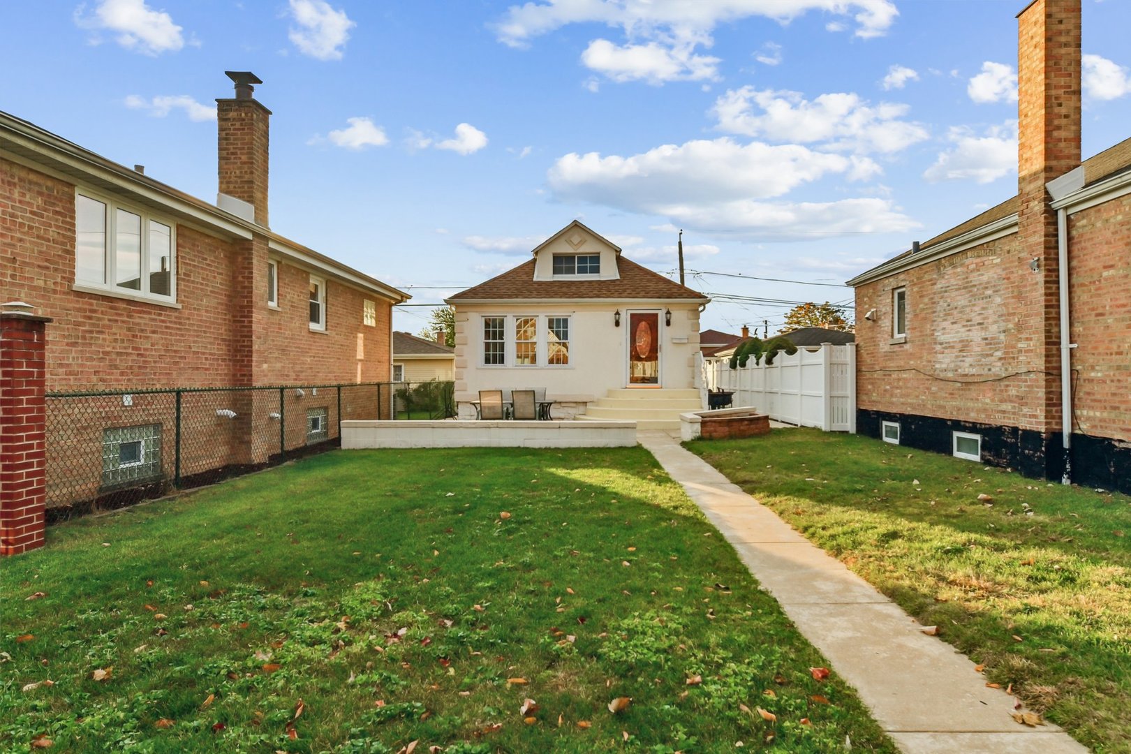 5536 South Normandy Avenue Chicago, IL 60638 - Photo 1 of 25 a front view of a house with garden
