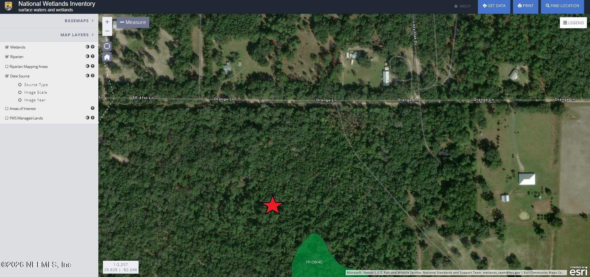 0 Off Orange Lane Hawthorne, FL 32640 - Photo 9 of 9 a view of a yard in a garden
