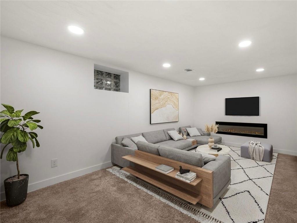 107 Marlboro Road Pittsburgh, PA 15238 - Photo 31 of 45 a living room with furniture and a flat screen tv