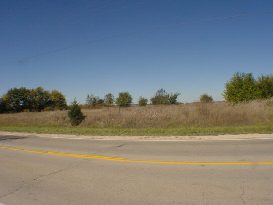 0 Rt 72 Kirkland, IL 60146 - Photo 1 of 2 a view of a lake and green valley
