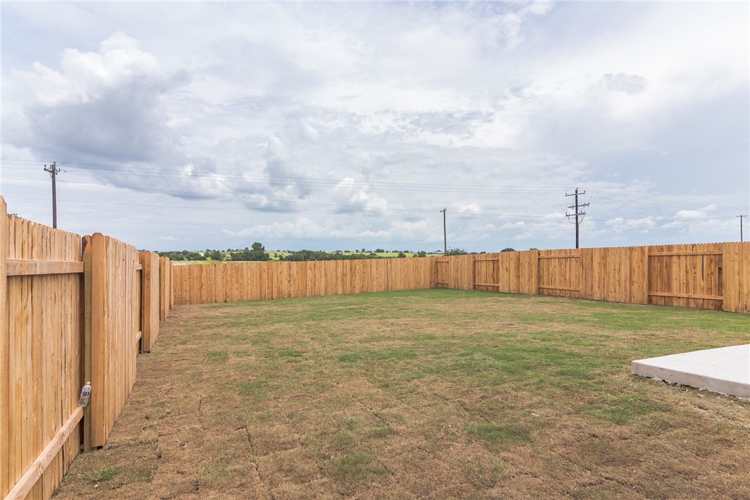 129 Wild Wind Trail Jarrell, TX 76537 - Photo 25 of 27 It is really big and completely fenced in. . Added benefit is there are no houses directly behind the rear fence.