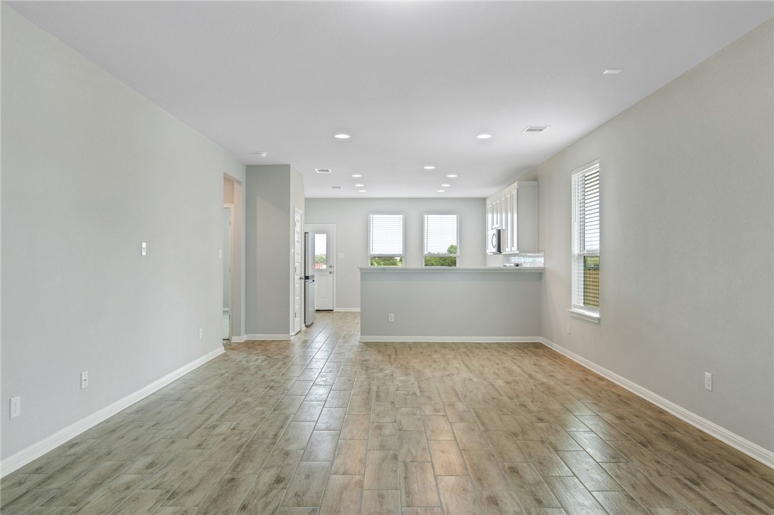 129 Wild Wind Trail Jarrell, TX 76537 - Photo 7 of 27 View of family room taken from foyer. Large sectionals are no problem.