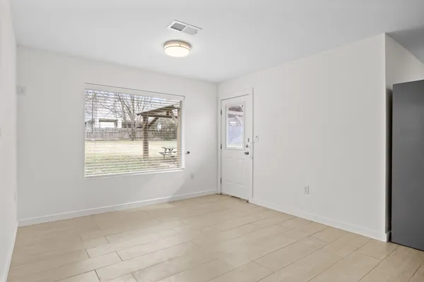 an empty room with windows