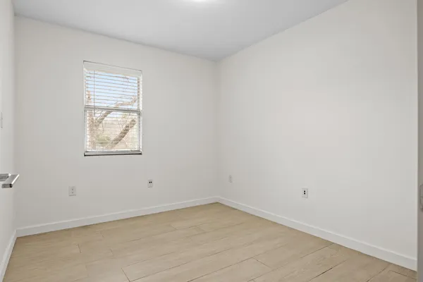 an empty room with a window