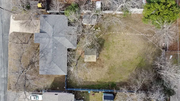 an aerial view of residential house with outdoor space