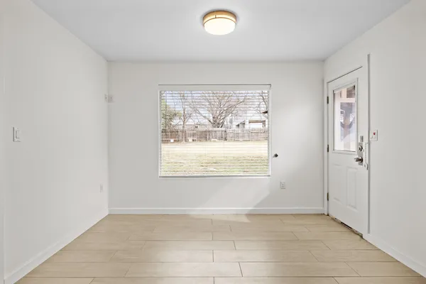 an empty room with windows