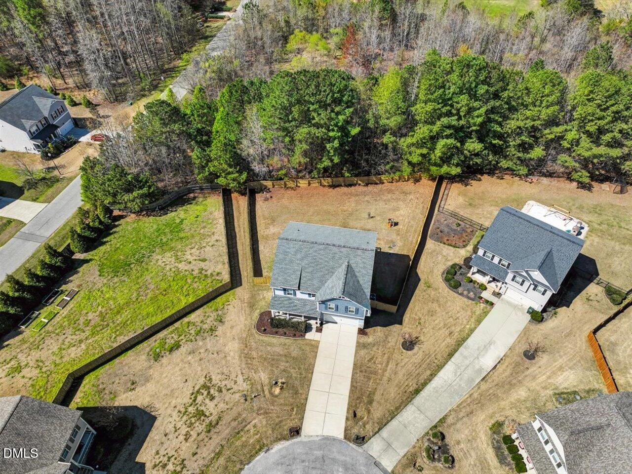 1200 Kinleywood Court Raleigh, NC 27603 - Photo 16 of 30 a view of yard from deck with patio