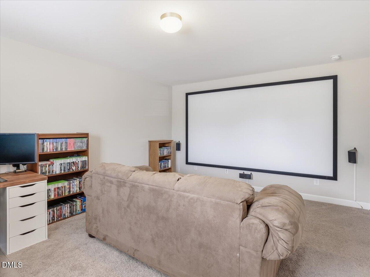 1200 Kinleywood Court Raleigh, NC 27603 - Photo 27 of 30 a room with a desk and a couch