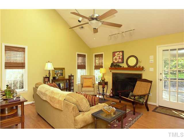 Spacious and sunny living room with views of private yard Living Room