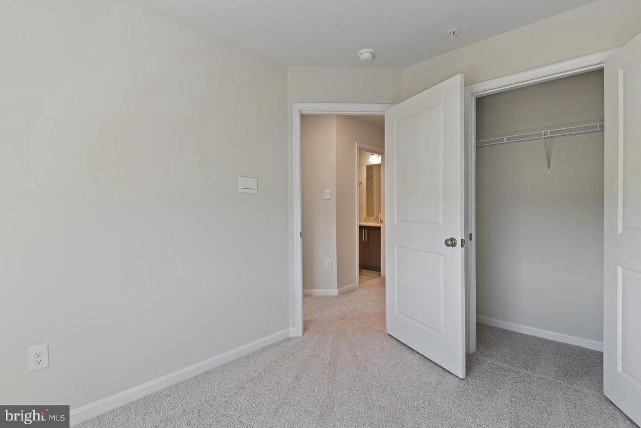 552 Union Street Frederick, MD 21701 - Photo 27 of 58 a view of an empty room and closet area