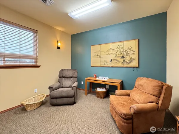 a room with furniture and a window