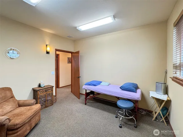 a room with furniture and a window