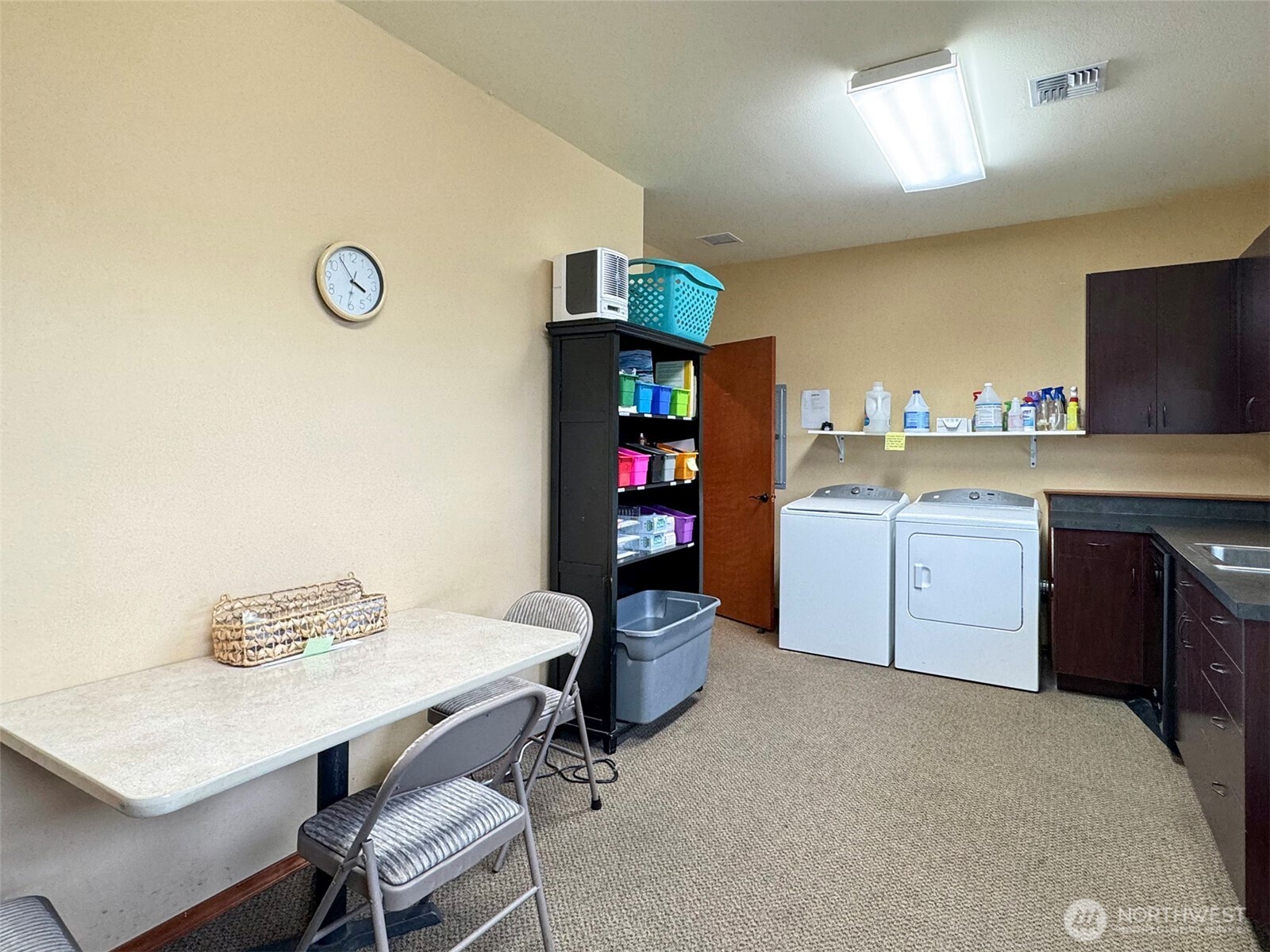 534 North 5th Avenue, Unit 7 Sequim, WA 98382 - Photo 29 of 38 a kitchen with a sink cabinets and appliances