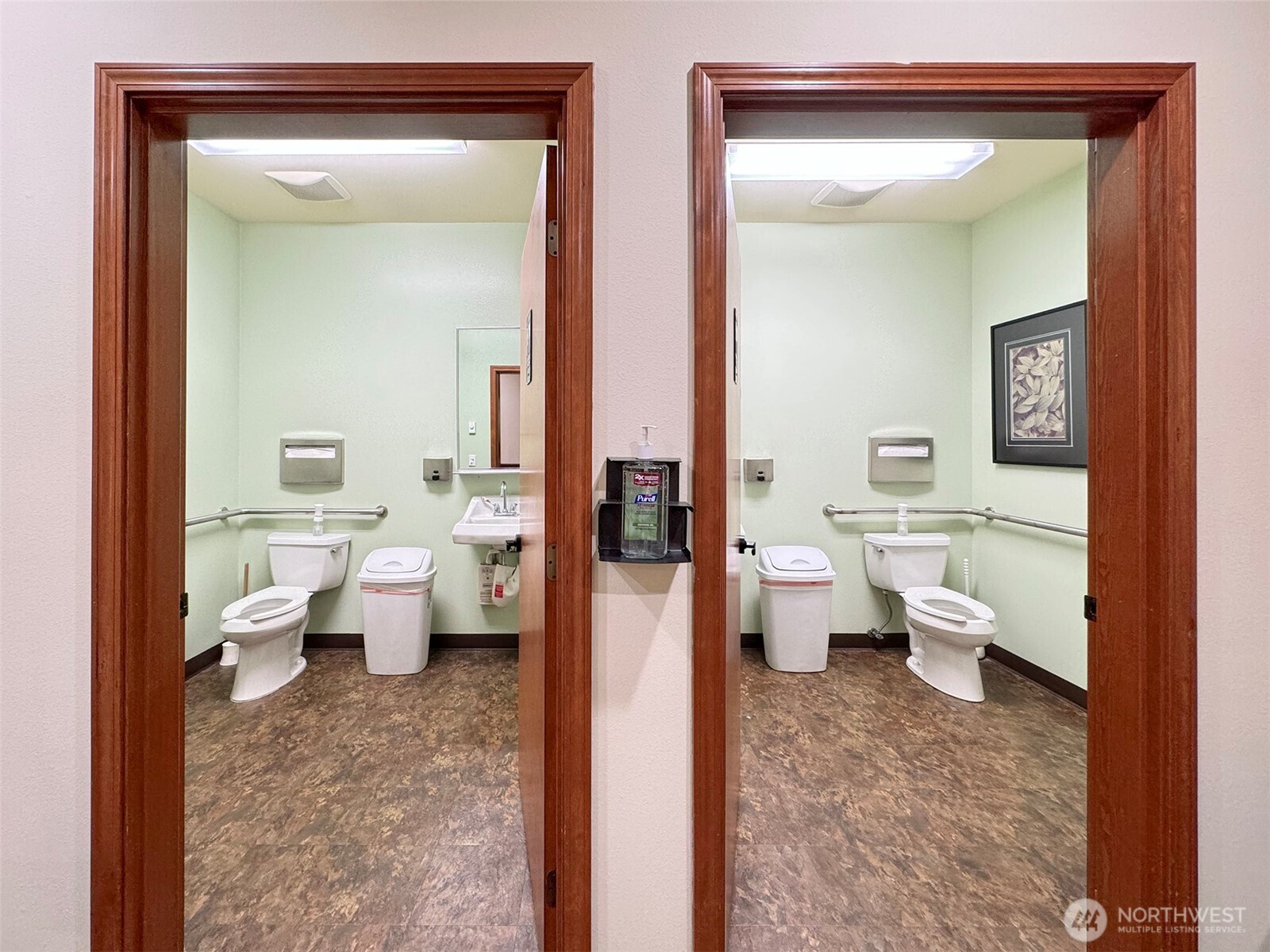 534 North 5th Avenue, Unit 7 Sequim, WA 98382 - Photo 31 of 38 a bathroom with a toilet sink and a mirror