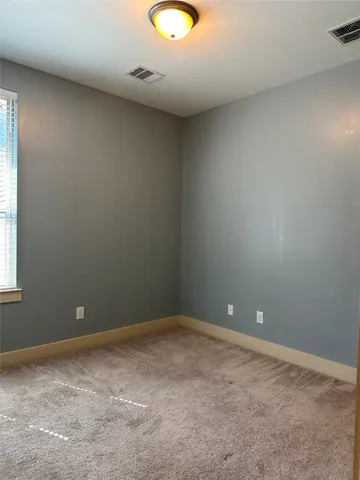 a view of an empty room with window