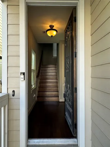 a view of swimming pool from a hallway