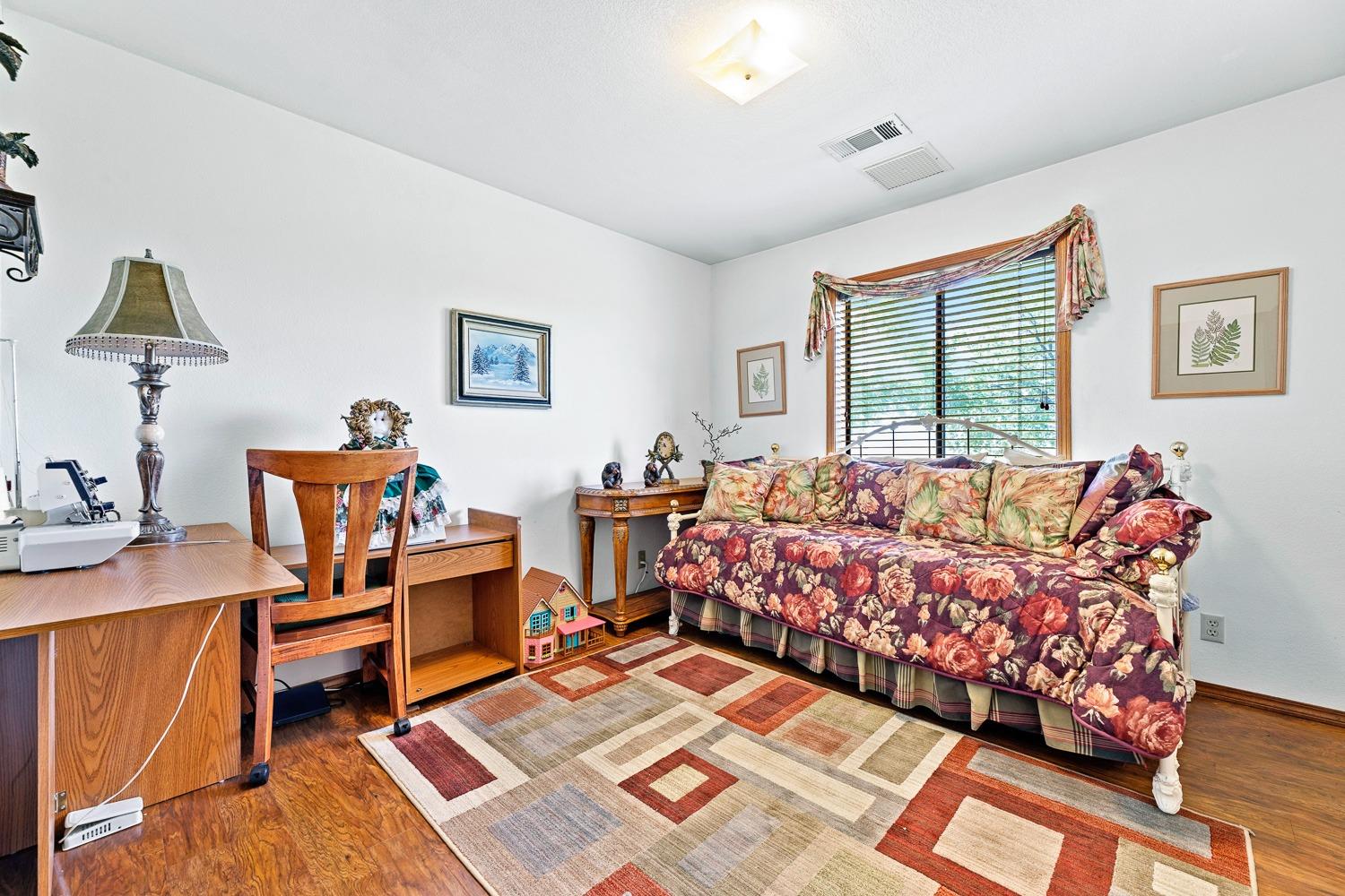 36360 Highway 33 Coalinga, CA 93210 - Photo 16 of 50 a bed room with furniture and a window