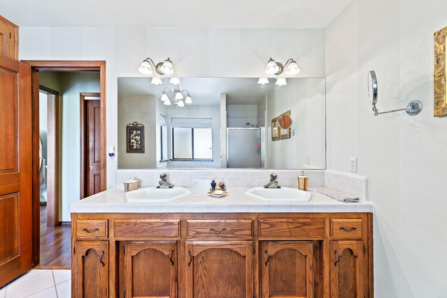 36360 Highway 33 Coalinga, CA 93210 - Photo 19 of 50 a bathroom with a sink double vanity and a mirror