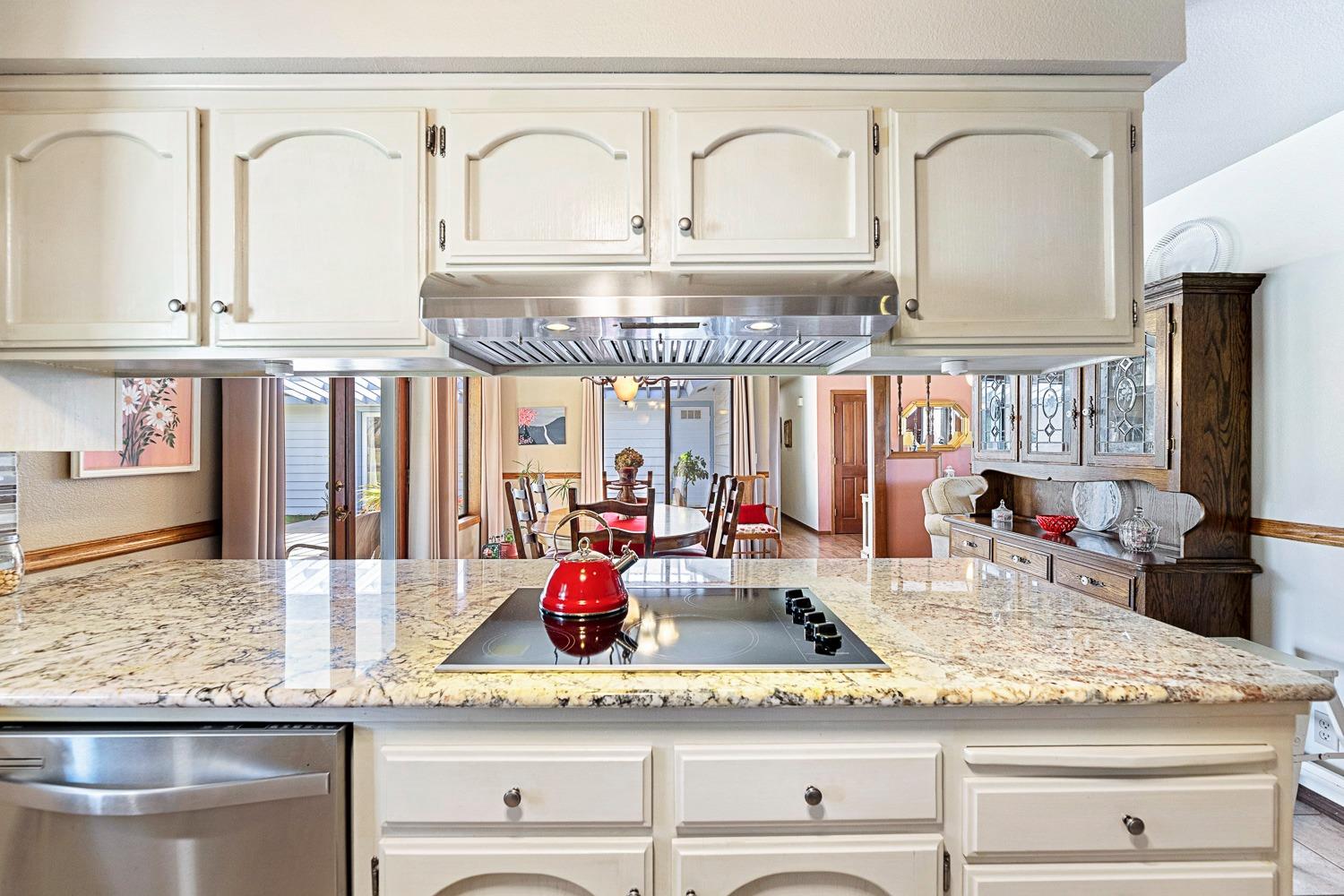36360 Highway 33 Coalinga, CA 93210 - Photo 33 of 50 a kitchen with stainless steel appliances granite countertop a sink and white cabinets