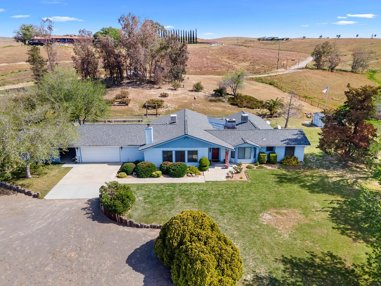 36360 Highway 33 Coalinga, CA 93210 - Photo 40 of 50 a aerial view of a house with a yard and lake view