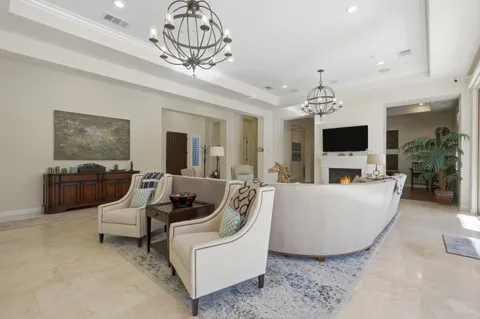 a large bathroom with a double vanity sink a mirror and a shower