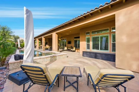 a view of a outdoor seating area with furniture