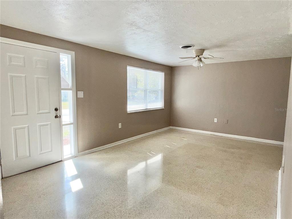 7441 Banner Street New Port Richey, FL 34653 - Photo 2 of 20 a view of an empty room with a window